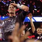 Houston, TX - 2/05/2017 - (4th Quarter/OT) New England Patriots quarterback Tom Brady (12) and his son celebrate with the Lombardi trophy. The Atlanta Falcons play the New England Patriots in Super Bowl LI at NRG Stadium in Houston on Feb. 5, 2017. - (Barry Chin/Globe Staff), Section: Sports, Reporter: Ben Volin, Topic: 06Super Bowl, LOID: 8.3.1481249206.