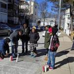 Friends and family mouned Brianna Hardy near the spot where she was shot to death on Juliette street in Dorchester. 
