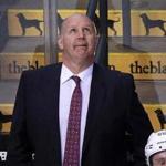 02/09/16: Boston, MA: The Bruins bench reflects the scene, as head coach Claude Julien watches the replay of the 8th goal of the game scored by the Kings on their way to a 9-2 victory. The Boston Bruins hosted the Los Angeles Kings in a regular season NHL hockey game at the TD Garden. (Globe Staff Photo/Jim Davis) section:sports topic:Bruins-Kings