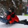 Chicldren went sledding on a Boston Common hill on Sunday.