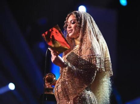 Beyoncé accepted the Grammy for best urban contemporary album on Sunday night.
