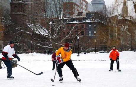 A group took to the ice at the Public Garden for an impromptu game of pond hockey.
