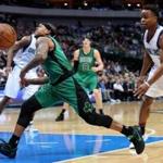 DALLAS, TX - FEBRUARY 13: Isaiah Thomas #4 of the Boston Celtics drives to the basket against Yogi Ferrell #11 of the Dallas Mavericks in the first half at American Airlines Center on February 13, 2017 in Dallas, Texas. NOTE TO USER: User expressly acknowledges and agrees that, by downloading and or using this photograph, User is consenting to the terms and conditions of the Getty Images License Agreement. (Photo by Tom Pennington/Getty Images)