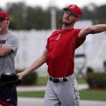 Fort Myers, FL - 2/13/2017 - Red Sox Spring Training. Day One. Boston Red Sox pitcher Chris Sale throws long toss as Red Sox Pitching coach Carl Willis, at left, observes. Pitchers and catchers report for spring training at Jet Blue Park in Fort Myers, FL. - (Barry Chin/Globe Staff), Section: Sports, Reporter: Peter Abraham, Topic: 14Res Sox, LOID: 8.3.1623409229.