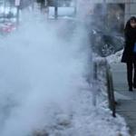 A cold start to the day as steam rose from a vent on Boylston Street. 