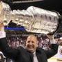 Boston Bruins head coach Claude Julien holds the Stanley Cup after his team defeated the Vancouver Canucks in Game 7 of the NHL Stanley Cup hockey playoff in Vancouver, British Columbia, June 15, 2011. REUTERS/Mike Blake (CANADA - Tags: SPORT ICE HOCKEY) NYTCREDIT: Mike Blake/Reuters 03STANLEYCUP