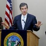 Governor Roy Cooper of north Carolina spoke Tuesday during a news conference in Raleigh, N.C.