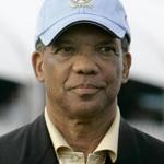 Ewart Brown, former premier of Bermuda, is accused in a lawsuit of accepting bribes to push business to Lahey Clinic. He is shown here at the trophy ceremony during the PGA Grand Slam of Golf tournament in 2007.