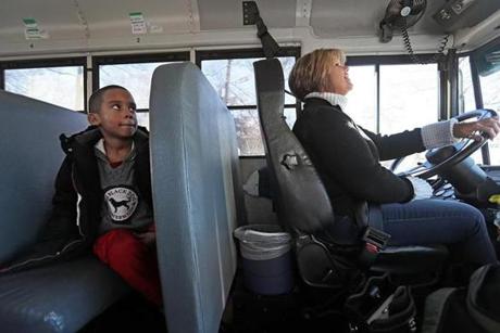 Jacqueline Merritt takes her son, Marcus, when she drives for field trips and sporting events.

