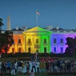 People gathered in Lafayette Park to see the White House illuminated with rainbow colors in commemoration of the Supreme Court's ruling to legalize same-sex marriage.