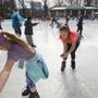 Robyn Wessman, 12, of Belmont, scooped up melting ice water at the Boston Common?s Frog Pond on Friday.