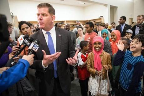 02/23/2017 BOSTON, MA Mayor Marty Walsh (cq) spoke to the media while surrounded by children during an immigrant and refugee community forum held at the Islamic Society of Boston Cultural Center. (Aram Boghosian for The Boston Globe) 
