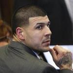 Former New England Patriots tight end Aaron Hernandez sits at the defense table during his double murder trial at Suffolk Superior Court in Boston, Thursday, March 2, 2017. Hernandez is charged in the July 2012 killings of Daniel de Abreu and Safiro Furtado who he encountered in a Boston nightclub. The former NFL football player already is serving a life sentence in the 2013 killing of semi-professional football player Odin Lloyd. (Keith Bedford/The Boston Globe via AP, Pool)