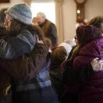 Congregants at Warwick Trinitarian Congregational Church comforted one another Sunday at a service remembering the five people killed in a weekend fire.