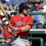 Boston Red Sox's Andrew Benintendi drives in two runs against the Atlanta Braves on a bases loaded single in the fourth inning of a spring training baseball game, Friday, March 3, 2017, in Kissimmee, Fla. (AP Photo/John Raoux)