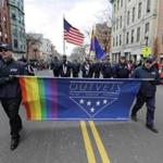 In this March 20, 2016 file photo, members of OUTVETS marchED in the annual St. Patrick's Day Parade inSouth Boston.