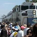 16commuterrail - July 15, 2006. Riders board the weekend Metro Train in San Clemente. The train is bound for the inland empire. Expanded weekend service for Metrolink started today with riders leaving from the Riverside area to the beach at San Clemente. (Glenn Koenig/Los Angeles Times)