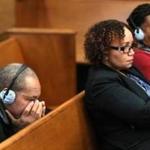 Boston, MA--3/16/2017 - Ernesto Abreu (cq) father of victim Daniel de Abreu (cq), center and Maria Teixeira,the mother of murder victim Safiro Furtado (right, in red), listens to the courtroom translation through earphones. Others sit in the section reserved for victim family members. The double murder trial of former New England Patriots tight end Aaron Hernandez (cq) continues in Suffolk Superior Court. He is accused of killing Daniel de Abreu (cq) and Safiro Furtado (cq) in Boston's South End, on July 16, 2012. POOL Photo by Pat Greenhouse/Globe Staff Topic: 17hernandez Reporter: XXX