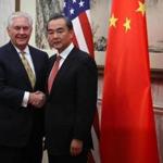 BEIJING, CHINA - MARCH 18: U.S. Secretary of State Rex Tillerson, left, shakes hands with with Chinese Foreign Minister Wang Yi, right, as he arrives for a bilateral meeting with U.S. Secretary of State Rex Tillerson, not shown, at the Diaoyutai State Guesthouse on March 18, 2017 in Beijing, China. (Photo by Mark Schiefelbein - Pool/Getty Images)