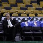 Boston Bruins General Manager Danny Ainge talks on the phone before an NBA basketball game in Boston, Wednesday, March 1, 2017. (AP Photo/Charles Krupa)