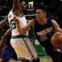 Suns guard Devin Booker drove on Celtics guard Marcus Smart in the first quarter.