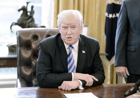 WASHINGTON, DC - MARCH 24: U.S. President Donald Trump reacts after Republicans abruptly pulled their health care bill from the House floor, in the Oval Office of the White House on March 24, 2017 in Washington, DC. In a big setback to the agenda of President Donald Trump and the Speaker, Ryan cancelled a vote for the American Health Care Act, the GOP plan to repeal and replace the Affordable Care Act, also called 'Obamacare.' (Photo by Olivier Douliery-Pool/Getty Images)
