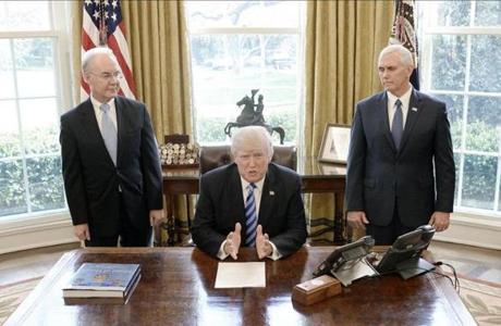 WASHINGTON, DC - MARCH 24: U.S. President Donald Trump reacts with HHS Secretary Tom Price (L) and Vice President Mike Pence (R) after Republicans abruptly pulled their health care bill from the House floor, in the Oval Office of the White House on March 24, 2017 in Washington, DC. In a big setback to the agenda of President Donald Trump and the Speaker, Ryan cancelled a vote for the American Health Care Act, the GOP plan to repeal and replace the Affordable Care Act, also called 'Obamacare.' (Photo by Olivier Douliery-Pool/Getty Images) *** BESTPIX ***

