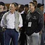 New England Patriots coach Bill Belichick, left, and Baltimore Ravens coach John Harbaugh watch during pro day at Ohio State University in Columbus, Ohio, Thursday, March 23, 2017. (AP Photo/Paul Vernon)