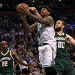 Boston, MA - 3/29/2017 - (2nd quarter) Boston Celtics guard Isaiah Thomas (4) is fouled by Milwaukee Bucks forward Spencer Hawes (00) on this drive during the second quarter. The Boston Celtics host the Milwaukee Bucks at TD Garden. - (Barry Chin/Globe Staff), Section: Sports, Reporter: Adam Himmelsbach, Topic: 30Celtics-Bucks, LOID: 8.3.2043907042.