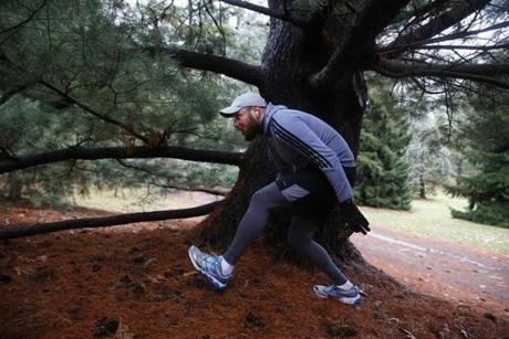 Jamaica Plain, Massachusetts -- 3/29/2017 - Rabbi Matt Soffer of Temple Israel searches for pine cones for Passover at the Arboretum. (Jessica Rinaldi/Globe Staff) Topic: 30seder Reporter: 
