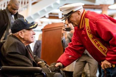 Thomas Hudner greeted John ?Red? Parkinson, who was a Marine in the Korean War and fought in the Chosin Reservoir, at a reception after the christening of the USS Hudner. 
