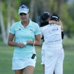 RANCHO MIRAGE, CA - APRIL 02: Lexi Thompson (L) walks off the 18th green, as So Yeon Ryu of the Republic of Korea celebrates with her caddie after Ryu defeated Thompson in a playoff during the final round of the ANA Inspiration at the Dinah Shore Tournament Course at Mission Hills Country Club on April 2, 2017 in Rancho Mirage, California. (Photo by Jeff Gross/Getty Images)
