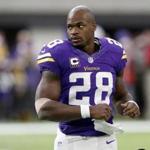 Minnesota Vikings running back Adrian Peterson warms up before the start of an NFL football game between the Indianapolis Colts and the Minnesota Vikings Sunday, Dec. 18, 2016, in Minneapolis. (AP Photo/Charlie Neibergall)