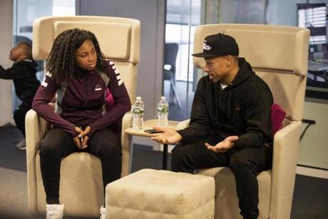 Boston, MA-March 25, 2017-Stan Grossfeld/Globe Staff- Boston Celtics point guard Isaiah Thomas and 17 year old Kalis (cq) Gregory of Hyde Park tour the MIT Media Lab. She is the first I.T.HELPDESK (cq) recipient. The two-time All Star started the one-on-one mentoring program to help kids overcome obstacles to achieving goals.
