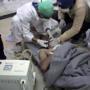 This frame grab from video provided on Tuesday April 4, 2017, by the Syrian anti-government activist group Edlib Media Center, that is consistent with independent AP reporting, shows a victim of a suspected chemical attack as he receives treatment at a makeshift hospital, in the town of Khan Sheikhoun, northern Idlib province, Syria. The suspected chemical attack killed dozens of people on Tuesday, Syrian opposition activists said, describing the attack as among the worst in the country's six-year civil war. (Edlib Media Center, via AP)