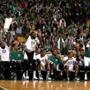Boston MA 3/12/17 Boston Celtics bench joining in with the fans and do, 