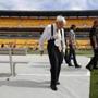 FILE--In this Sept. 28, 2014 photo Pittsburgh Steelers Chairman Dan Rooney visits the field before the NFL football game between the Pittsburgh Steelers and the Tampa Bay Buccaneers in Pittsburgh. The Steelers announced that Mr. Rooney died Thursday, Apr. 13, 2017. He was 84. (AP Photo/Gene J. Puskar)