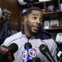 New England Patriots cornerback Malcolm Butler faces reporters in the team's locker room following an NFL football team practice, Thursday, Jan. 26, 2017, in Foxborough, Mass. The Patriots are to play the Atlanta Falcons in Super Bowl LI, Feb. 5, 2017, in Houston. (AP Photo/Steven Senne)