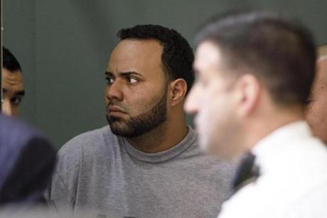Angelo Colon-Ortiz listened to his attorney at his arraignment Tuesday. 
