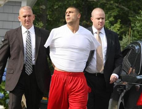 When State Police detectives lugged him from his big, beautiful house on June 26, 2013, Aaron Hernandez looked like a hulking, male version of the Venus de Milo. 
