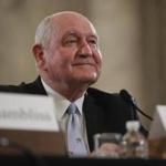 FILE - In this March 23, 2017 file photo, Agriculture Secretary-designate, former Georgia Gov. Sonny Perdue arrives to testify on Capitol Hill in Washington to testify at his confirmation hearing before the Senate Agriculture, Nutrition and Forestry Committee. After months of delays, the Senate is expected to confirm Agriculture Secretary nominee Sonny Perdue on Monday, April 24, 2017, with bipartisan support. (AP Photo/Pablo Martinez Monsivais, File)
