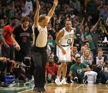 Boston MA 4/26/17 Boston Celtics Avery Bradley after knocking down a 3-point basket over Chicago Bulls Robin Lopez during third quarter action of game 5 of the NBA Playoffs at TD Garden. (Photo by Matthew J. Lee/Globe staff) topic: reporter: 

