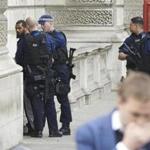 Firearms officiers from the British police detain a man on Whitehall near the Houses of Parliament in central London on April 27, 2017 before being taken away by police. Metropolitan police attended an incident on Whitehall in central London near the Houses of Parliament where one man was arrested, police said. / AFP PHOTO / Niklas HALLE'NNIKLAS HALLE'N/AFP/Getty Images