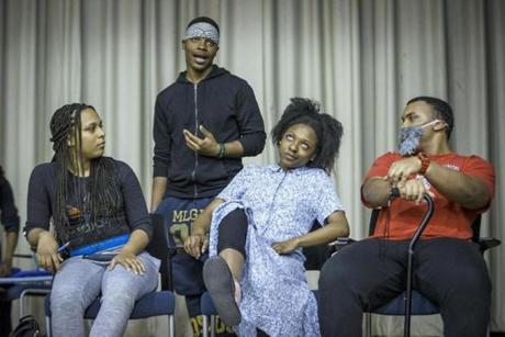 Boston, MA - 4/25/2017 - Performers Taya Hopkins(L), John Turner(2nd L), Carrie Mays, and Carlos Barbosa(R) run through a performance during a rehearsal for Teen Empowerment's 25th Annual Youth Peace Conference in Boston, MA, April 25, 2017. (Keith Bedford/Globe Staff)
