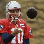 New England Patriots quarterback Jimmy Garoppolo catches a ball during an NFL football practice, Wednesday, Jan. 4, 2017, in Foxborough, Mass. (AP Photo/Steven Senne)