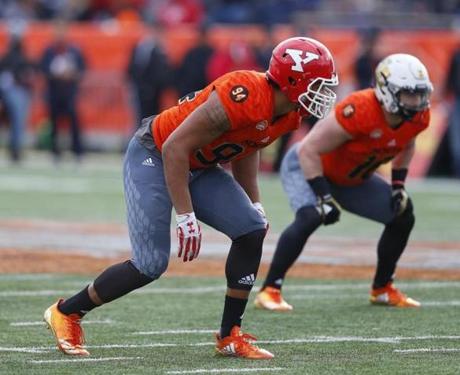 North squad outside linebacker Derek Rivers of Youngstown State (94) lines up for a play during the second half of the Senior Bowl NCAA college football game, Saturday, Jan. 28, 2017, at Ladd-Peebles Stadium in Mobile, Ala. (AP Photo/Butch Dill)
