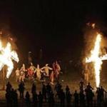 Klansmen participated in cross and swastika burnings last year after a 