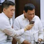Filipino leader Rodrigo Duterte (right) has been accused of human rights abuses.
