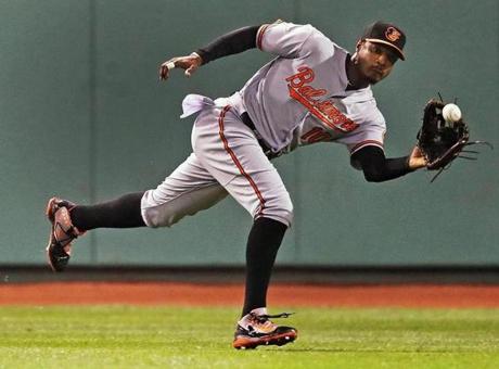 Boston, MA May 1, 2017: Orioles CF Adam Jones made a nice running catch to takea hit away from the Red Sox Mitch Moreland and end the 8th inning. The Boston Red Sox hosted the Baltimore Orioles in a regular season MLB base ball game at Fenway Park. (Globe Staff Photo/Jim Davis)
