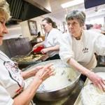 Joanne Messina (left) and Ruth Messina prepared crispelli on the Italian Kitchen?s last day of business. 